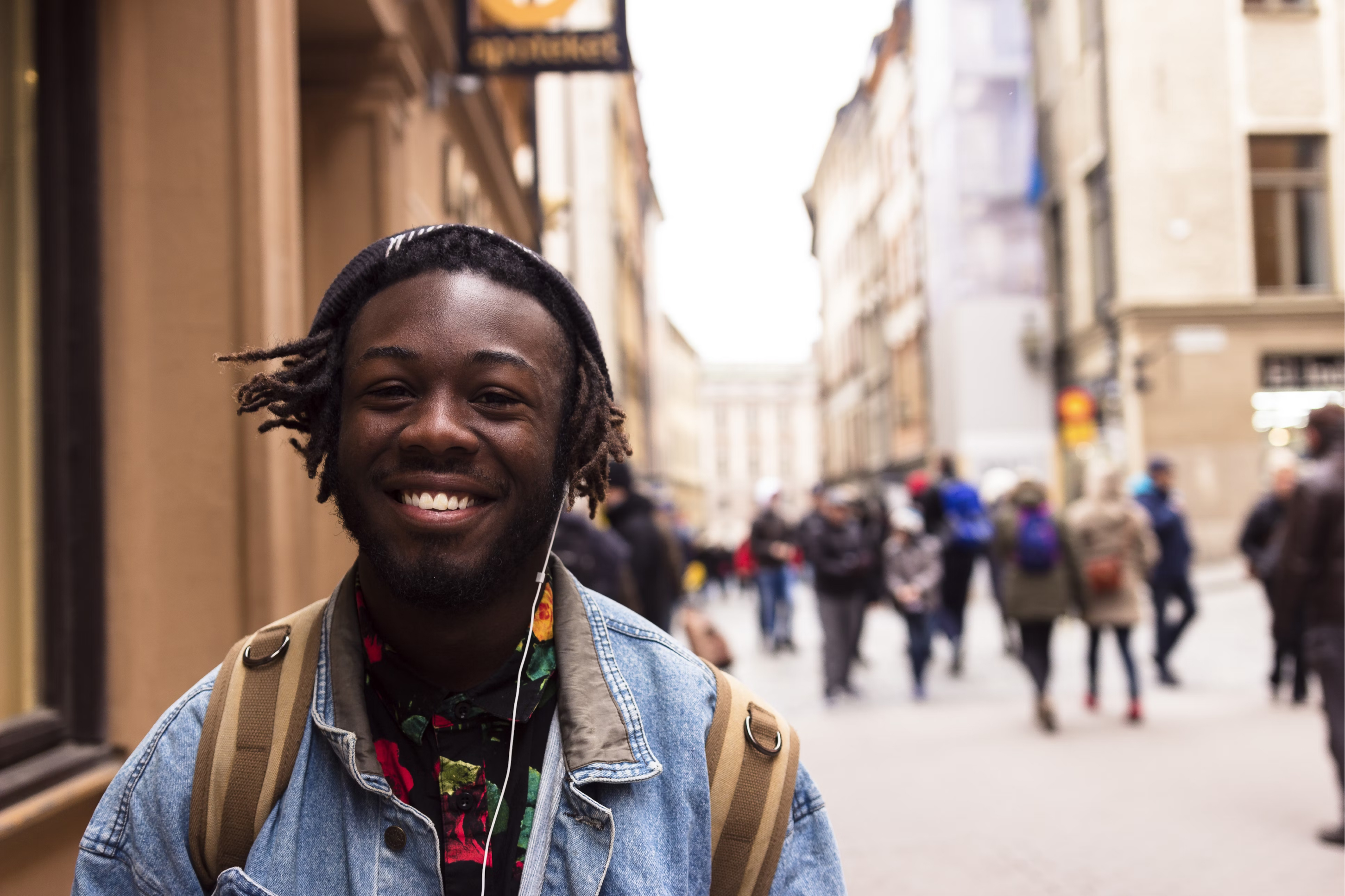 A young happy guy out selling